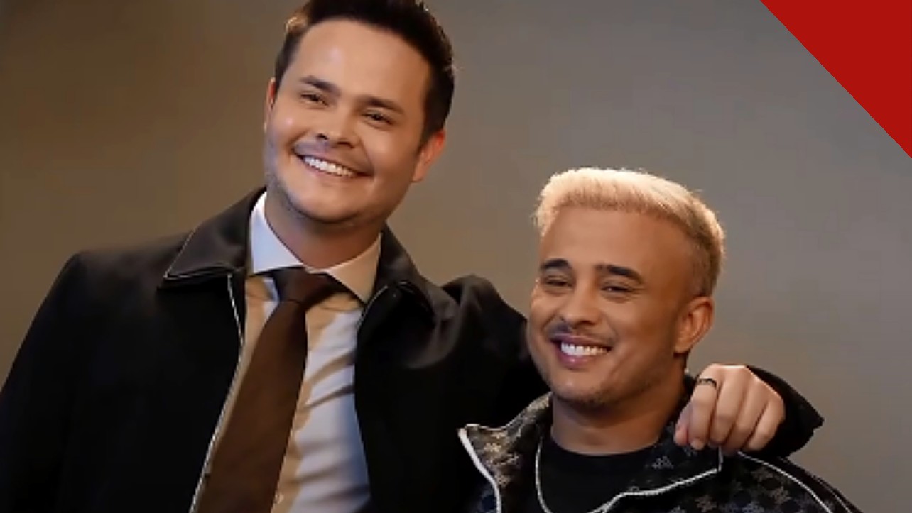 Kauan cancela compromissos por virose forte: Matheus e Kauan sorrindo em foto de divulgação da dupla sertaneja