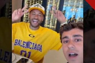 O Neymar faz o 22 com Nikolas Ferreira: o jogador de camiseta amarela ao lado do deputado na gravação do vídeo