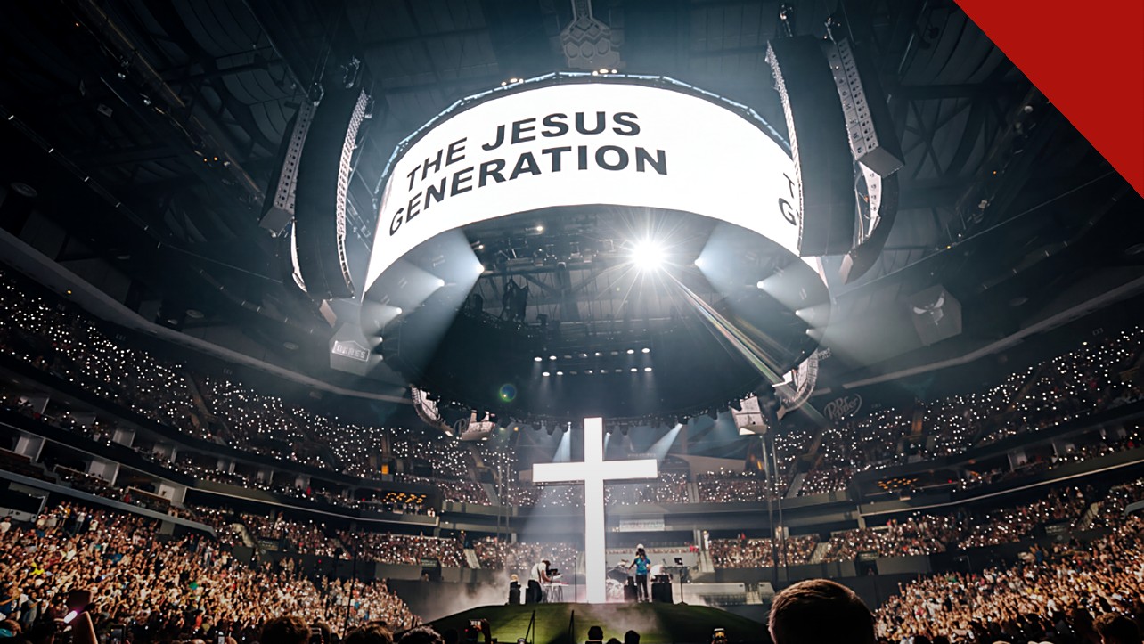 Forrest Frank anuncia documentário: arena lotada da Jesus Generation Tour com a cruz iluminada no palco e o telão da turnê