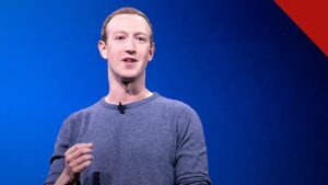 Zuckerberg avalia deixar a Califórnia: Mark Zuckerberg falando ao microfone em conferência da Meta, sobre fundo azul, com o rosto bem iluminado