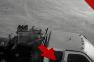 assassino foge de prisão no Tennessee em quadro de câmera de segurança do fugitivo roubando uma caminhonete branca