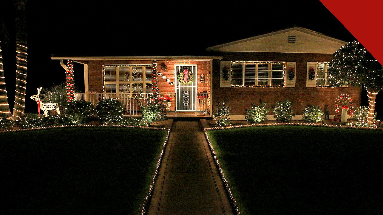 Pregador do Arizona processa Tucson: casa decorada com luzes de Natal no Winterhaven Festival of Lights, em Tucson, durante a noite