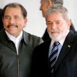 ditador da Nicarágua comemora vitória de Lula em carta oficial, e a imagem mostra Daniel Ortega ao lado de Lula sorrindo em encontro oficial