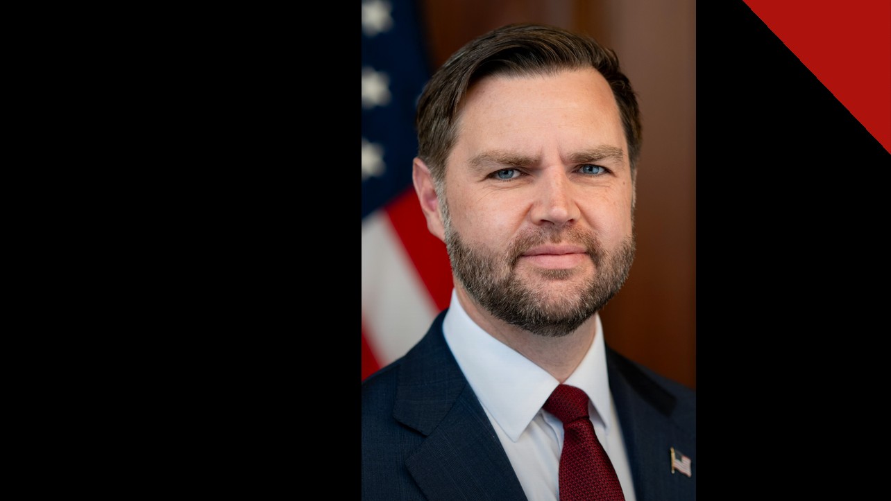 Vance se recusa a endossar Netanyahu: retrato oficial do vice-presidente dos EUA, J. D. Vance, de terno e gravata vermelha diante da bandeira americana