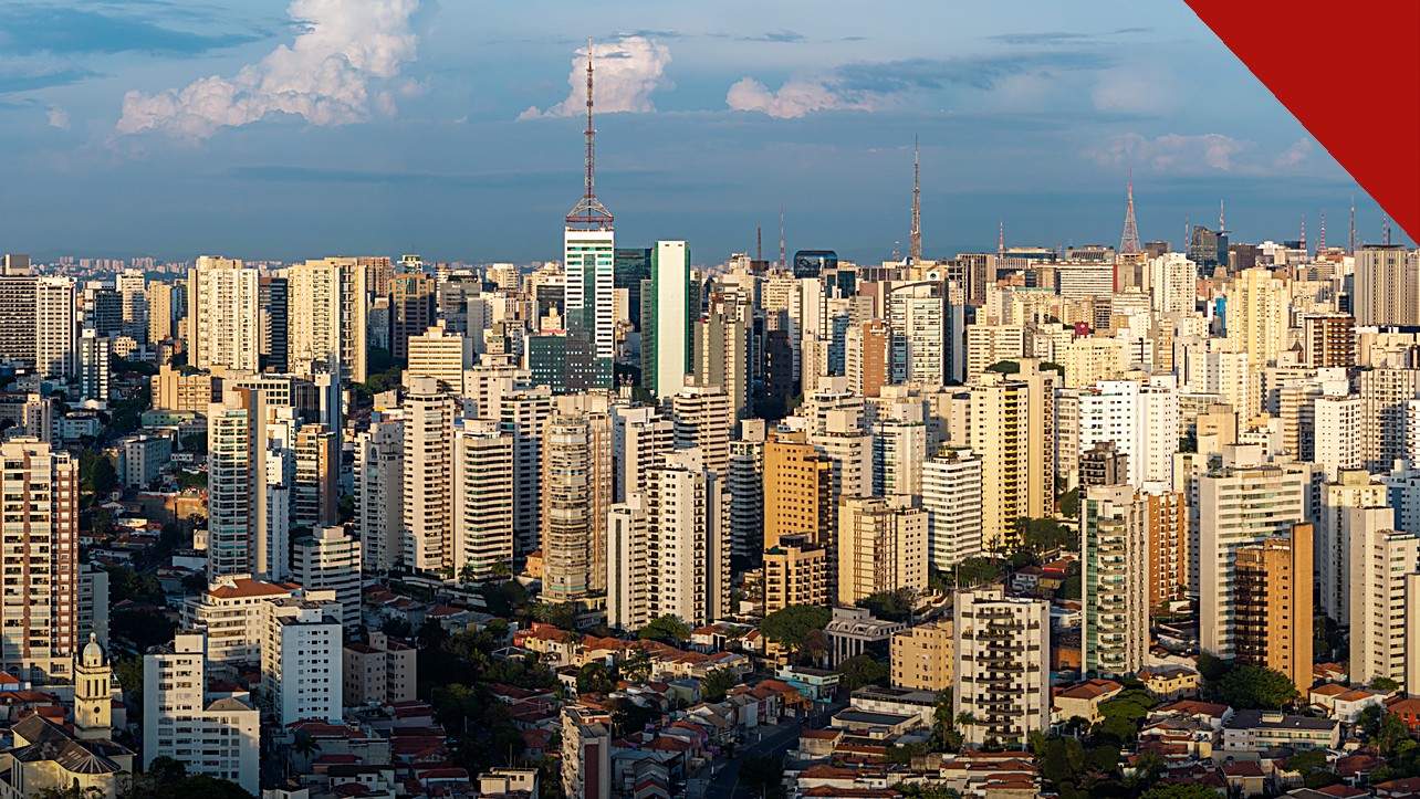 encontro de jovens líderes cristãos em São Paulo, e a imagem mostra um panorama aéreo da cidade de São Paulo, sede do Younger Leaders Gathering em 2027
