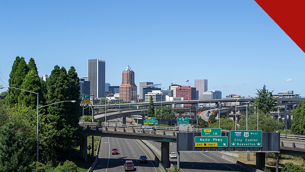 distrito de Portland revoga proibição contra mãe cristã, e a imagem mostra a vista da cidade de Portland, no Oregon, onde fica o distrito escolar que firmou o acordo com Allison Roberts
