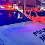 Mulher simula pedido de pizza: viaturas da Polícia Militar de São Paulo em atendimento noturno, em foto de divulgação da PMESP