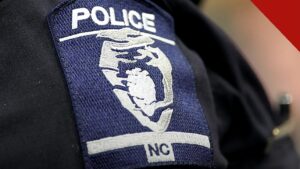 Distintivo da polícia de Charlotte; caso em que cinco policiais de Charlotte renunciam após mensagens racistas