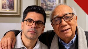 Pai de Paulo César Baruk: o pastor Eugênio Virginio da Silva abraçado ao filho em foto de família